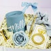 A photo of all the items that are included in the Supreme Gift basket option. Will you be my maid of honor Gift with a Port Wine Personalized Tumbler in Dusty Blue Wedding Color