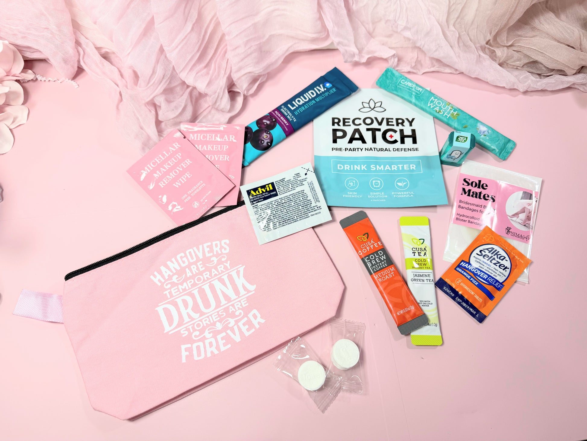 💊 Advil &amp; Alka-Seltzer – the classic duo for next-morning relief

💄 Makeup wipes – freshen up fast before brunch

🍵 Cold Tea &amp; Cold Coffee – refresh and re-energize (Option 2)


🤭 Mouthwash – for that minty fresh start

👠 Sole Mate blister band aids – because dancing all night has its price

💧 Recovery patch – rehydrate and revive

➕ Liquid I.V. packet – instant electrolyte boost

🍬 Mini Tic Tacs – stay cute, stay fresh

🙌 Mini towels – wipe away the nig