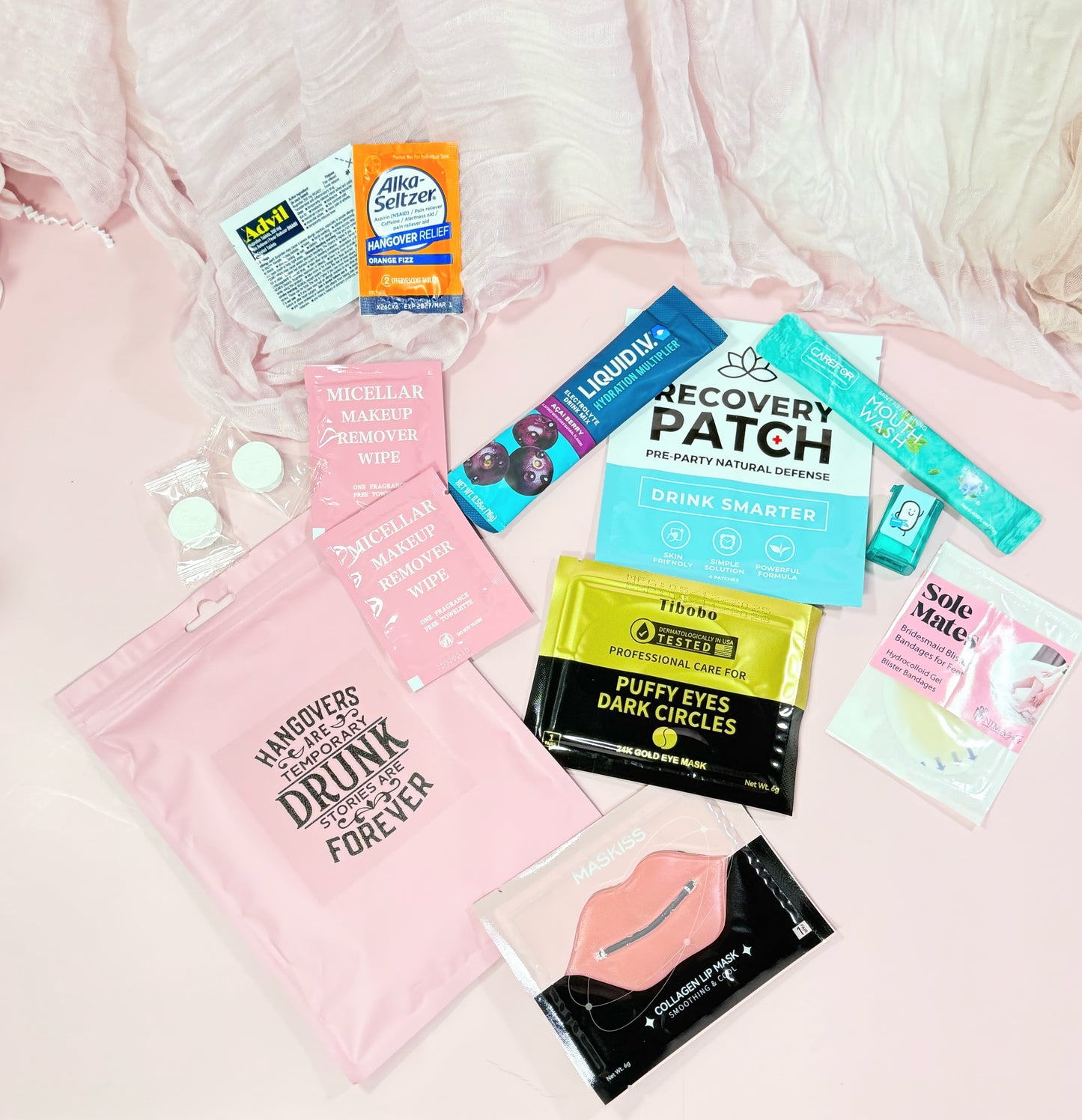 Pink Poly Pouch version of what is included in this option;
💊 Advil &amp; Alka-Seltzer – the classic duo for next-morning relief

💄 Makeup wipes – freshen up fast before brunch

😎 Eye mask&amp; lip mask (option 1)

🤭 Mouthwash – for that minty fresh start

👠 Sole Mate blister band aids – because dancing all night has its price

💧 Recovery patch – rehydrate and revive

➕ Liquid I.V. packet – instant electrolyte boost

🍬 Mini Tic Tacs