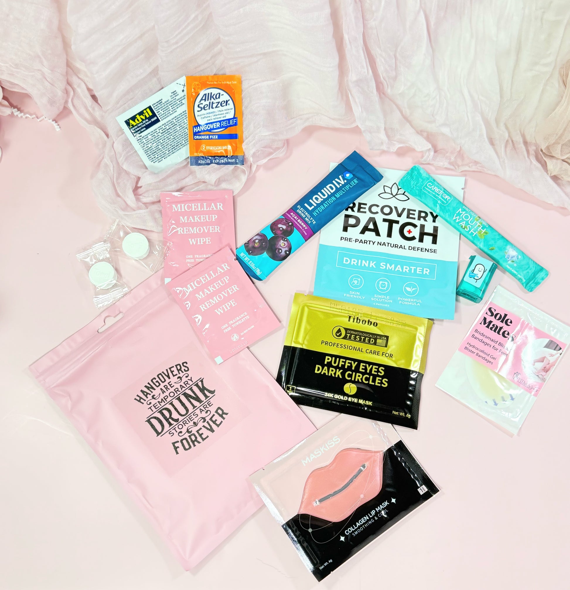 Pink Poly Pouch version of what is included in this option;
💊 Advil &amp; Alka-Seltzer – the classic duo for next-morning relief

💄 Makeup wipes – freshen up fast before brunch

😎 Eye mask&amp; lip mask (option 1)

🤭 Mouthwash – for that minty fresh start

👠 Sole Mate blister band aids – because dancing all night has its price

💧 Recovery patch – rehydrate and revive

➕ Liquid I.V. packet – instant electrolyte boost

🍬 Mini Tic Tacs