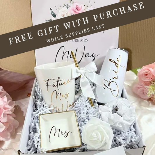 Gift set with 'Future Mrs.' and 'Bride' items in a decorative box with flowers.