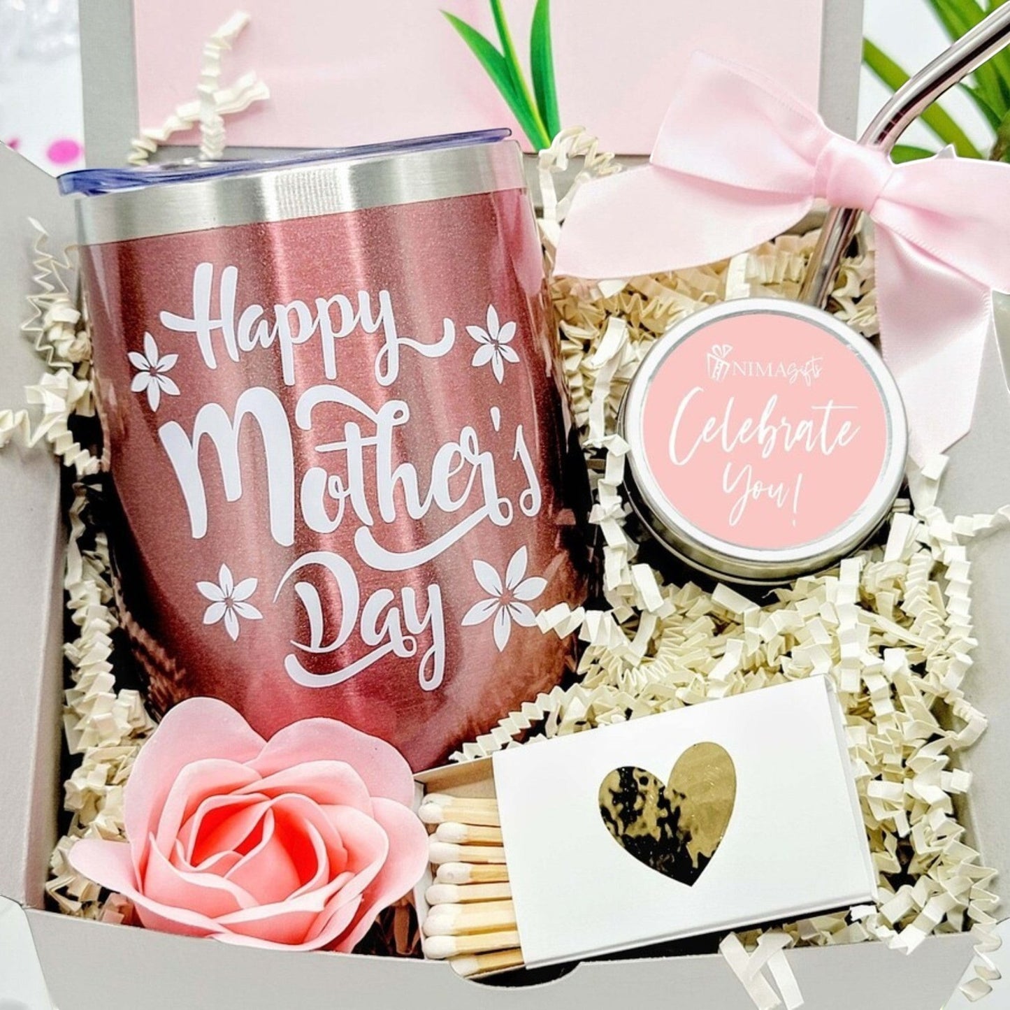 NIMA Gifts rose gold tumbler with "Happy Mother's Day" text, soy candle, soap rose, and matches in a gift box.