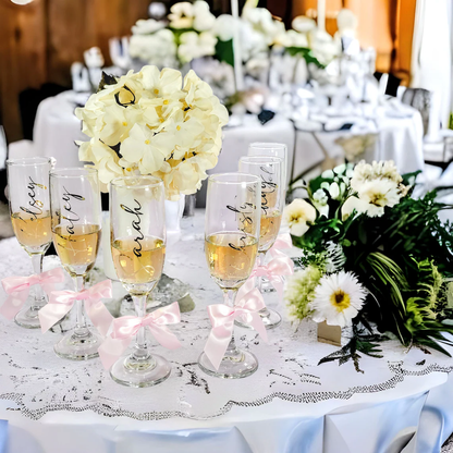 Personalized champagne flutes with bridesmaid and bachelorette party designs by NIMA Gifts, perfect for girls' night and wedding celebrations.