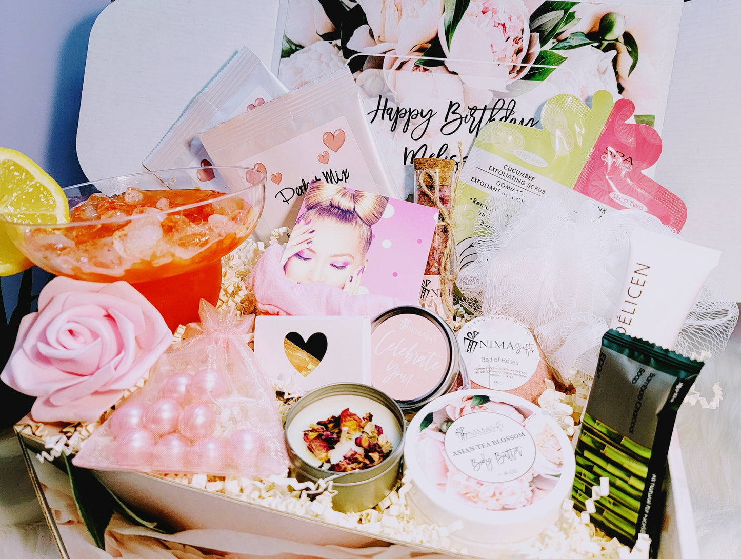 Luxury margarita lover gift set in a personalized box filled with margarita mix and spa items such as body cream, bath beads, bath bomb, candle and matches, black soap, masks, so much more. All she needs to relax and have a sip of her favorite margarita drink.