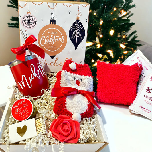 Modern and unusual Christmas gift box for her with a red wine tumbler personalized with her name, a hand poured candle fuzzy socks and a red rose. Delightful Gift
#christmasgifts2023
#holidaygifts
#christmasgiftbox
#christmasgiftset
#uniquegiftforher
