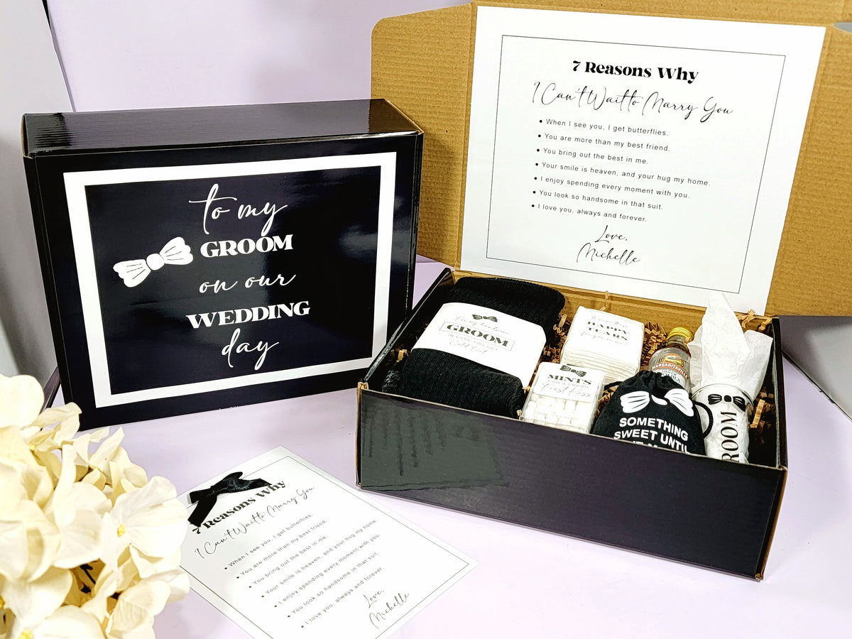 This bride to groom day of wedding gift box is not just a gift box; it's an experience that sets the tone for your unforgettable day. Make your groom's heart melt with this thoughtful, stylish, and unique gift box that contains a pair socks that have grooms initials on them, a shot glass that says groom, a box of mints for a fresh first kiss, a pack of tissues to wipe away those tears, and a black velure bag that says “Something Sweet Until we Meet” or “Groom’s Courage” on it filled with