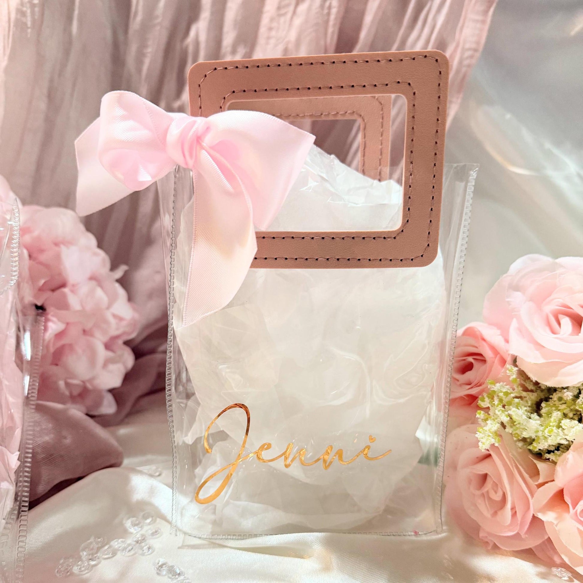 Personalized Clear Tote Bag with Leatherette handles in duty rose and a white bow.