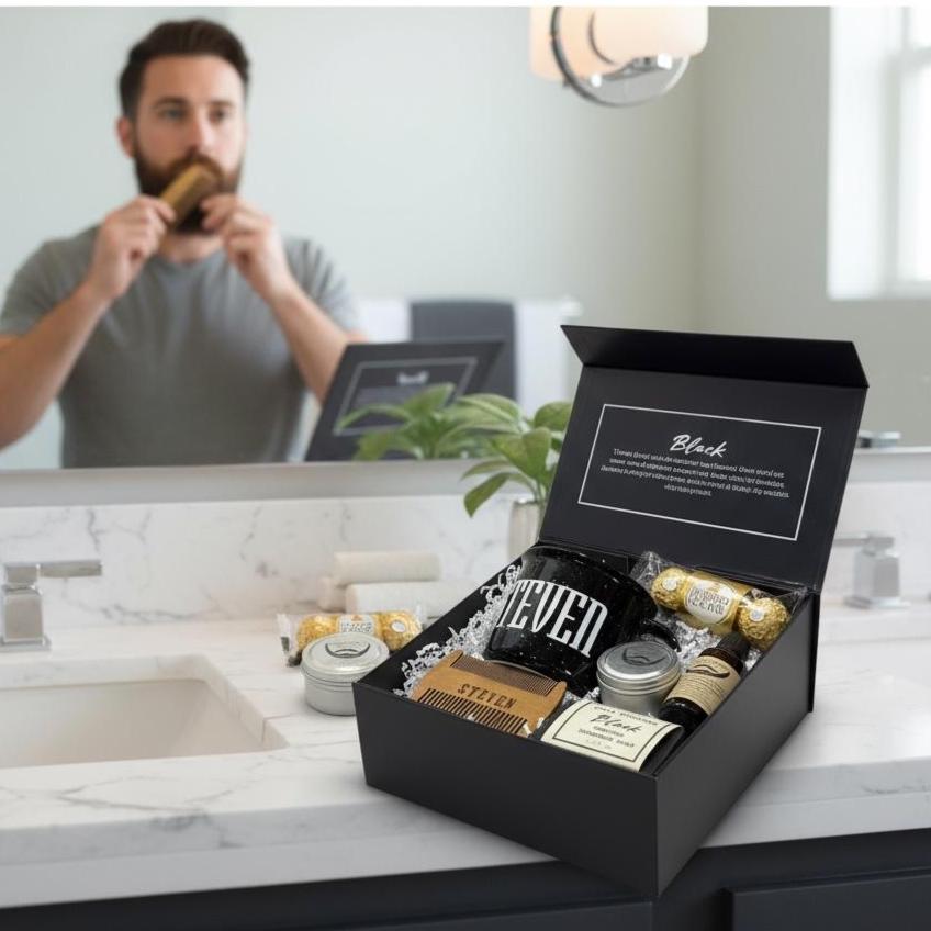 Man styling his beard in the bathroom while his personalized men’s birthday gift box sits on the counter. Complete with a custom mug, engraved beard comb, soap, beard balm, beard oil, and Ferrero Rocher chocolates, this luxury grooming set is modern, masculine, and thoughtful. A chic gift for women shopping for boyfriends, husbands, or dads – ideal for birthdays, Father’s Day, Christmas, anniversaries, or Valentine’s Day. Trendy, personalized, and guaranteed to make him feel celebrated.