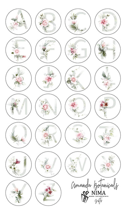 Personalized floral initial compact mirror by NIMA Gifts, ideal as bridesmaid, flower girl, or birthday gift, showing a floral design.