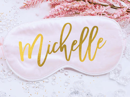 Personalized silky satin sleep mask with "Tired as A Mother" text, soft fabric, ideal for restful sleep or gift for moms.