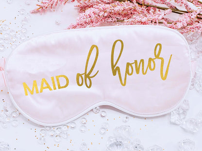 Personalized silky satin sleep mask with "Tired as A Mother" text, soft fabric, ideal for relaxing or gifting to moms