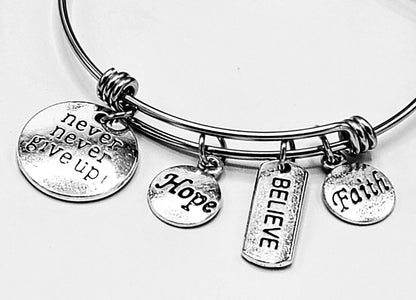 Friendship Inspiration charm bracelet with silver chain and heart-shaped charms, featuring engraved inspirational messages.