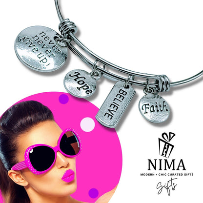 Silver friendship charm bracelet with engraved inspirational message and delicate chain design, ideal for friendship gift.