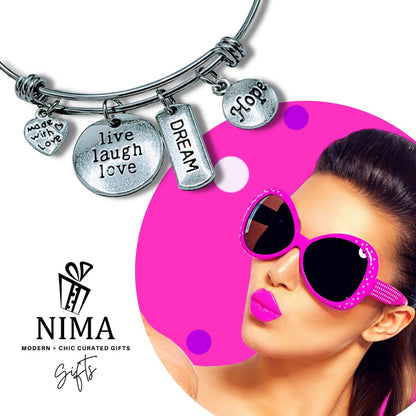 Friendship Inspiration charm bracelet with colorful beads and silver charms, designed for celebrating friendship.