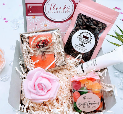 NIMA Gifts coffee-themed teacher gift box with a thank you card and assorted treats, perfect end-of-year appreciation for teachers.
