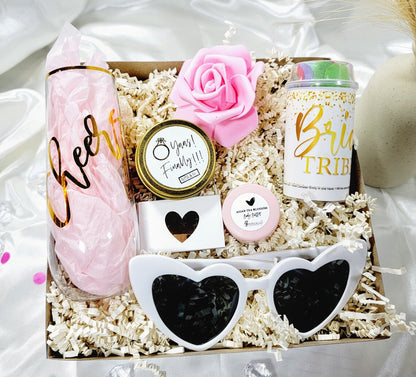 Pink and gold personalized bridesmaid proposal box set with blush accents, includes "Will You Be My Bridesmaid" message and elegant details.