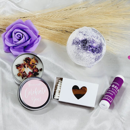 Purple self-care gift box with lavender spa items, perfect for a thoughtful gift for a friend or woman, includes caring self-care products.