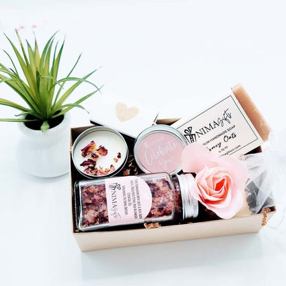 Personalized self care spa gift box for women with bath products, skincare, and relaxation items in a beautifully arranged set.