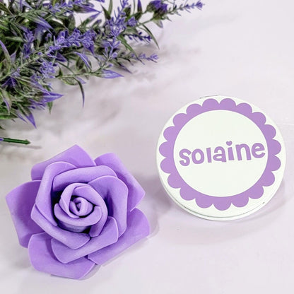 Pink and purple flower girl proposal compact mirror with gold accents, featuring floral design, perfect junior bridesmaid gift from NIMA Gifts.