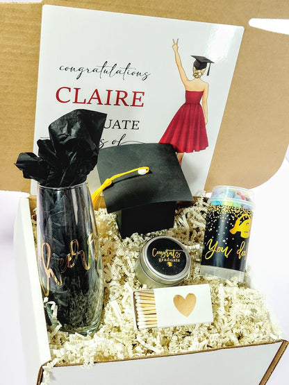 Personalized graduation gift box for women by NIMA Gifts, includes luxury items for high school or college grads, 2026 celebration.