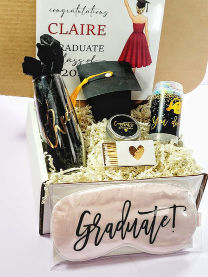 Personalized graduation gift box for women with luxury items, celebrating college or high school graduation in 2026.