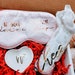 Personalized graduation gift box for her with diploma, flowers, and keepsakes, celebrating high school or college graduation.