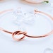 Personalized bridesmaid proposal bracelet with custom initial charm, elegant jewelry for bridal party and wedding gifts.