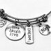 Friendship Inspiration Charm Bracelet with colorful beads and metal charms, designed for friendship and meaningful gestures.