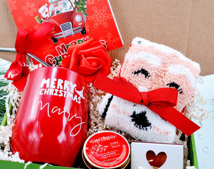 Cozy Christmas gift box for women with festive gifts, including a basket and holiday-themed items from NIMA Gifts.