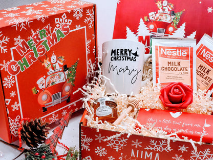 Christmas gift box for women featuring assorted holiday treats and gifts, perfect for friends, besties, or coworkers.