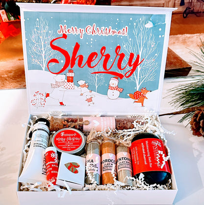 Spa gift box for women featuring bath bombs, lotions, and skincare products in a festive Christmas gift set.